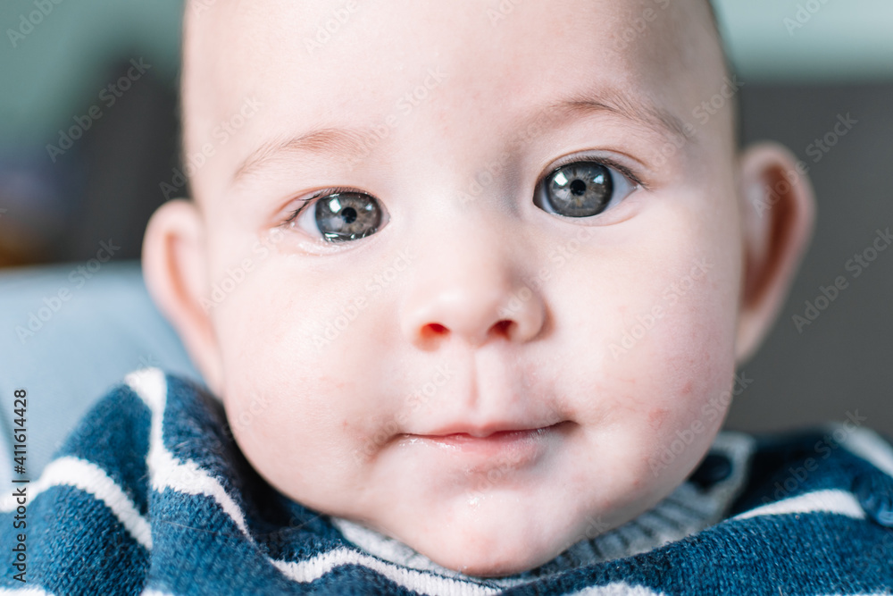 CLOSE UP OF CAUCASIAN BABY BOY