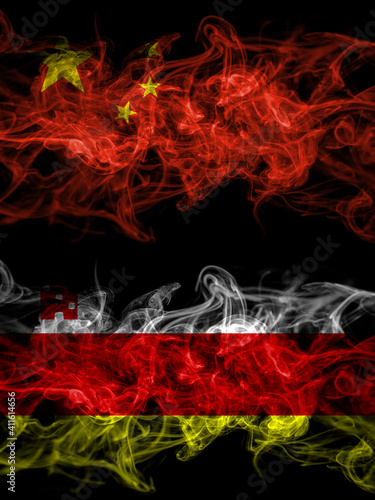 China, Chinese vs United States of America, America, US, USA, American, Santa Barbara, California smoky mystic flags placed side by side. Thick colored silky abstract smoke flags.