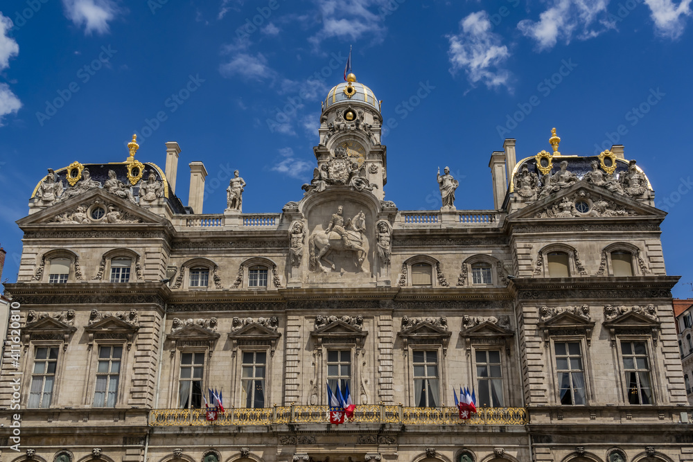 Architectural fragments of the Lyon City Hall building (Hotel de Ville, from 1672) - one of the largest historic buildings in the city on Place des Terreaux. Lyon, France.