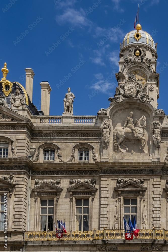 Architectural fragments of the Lyon City Hall building (Hotel de Ville, from 1672) - one of the largest historic buildings in the city on Place des Terreaux. Lyon, France.