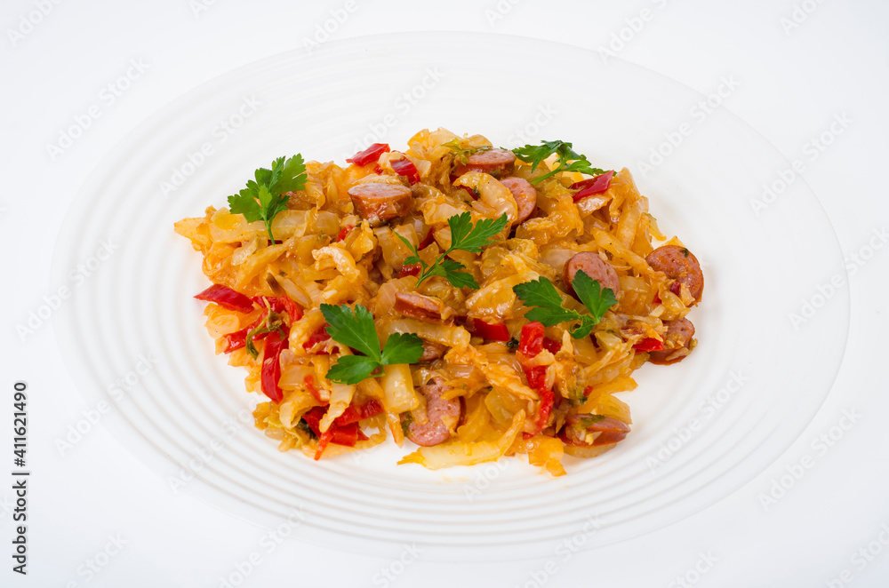 Stewed vegetables, cabbage, paprika with sausages Stewed vegetables, cabbage, paprika with sausages
