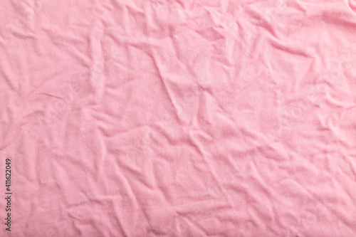 Wallpaper Mural Fragment of pink cotton tissue. Top view, natural textile background. Torontodigital.ca