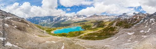 Spectacular mountain panorama of late snow covering slopes.