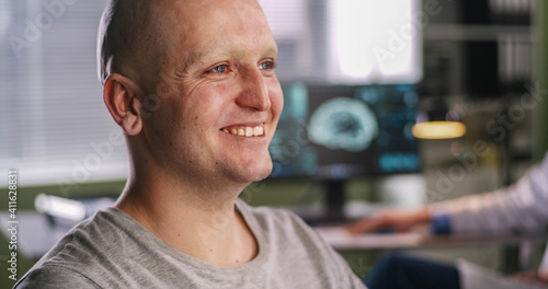 фотографія Oncologist telling good news to praying patient