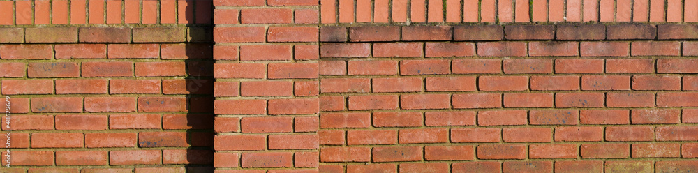 Weathered old brick wall in header format with space for copy Weathered old brick wall in header format with space for copy