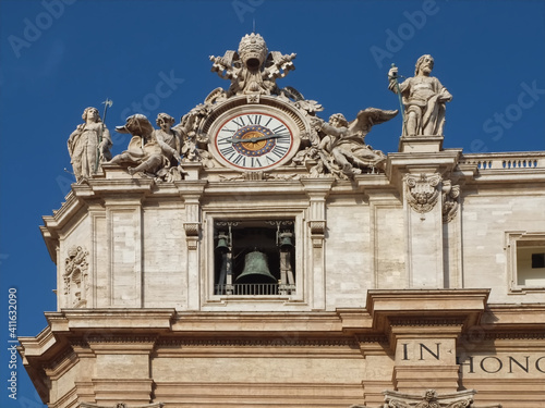 Sculpture on Famous St. Peters square or Piazza San Pietro in Rome with Saint Peter basilica