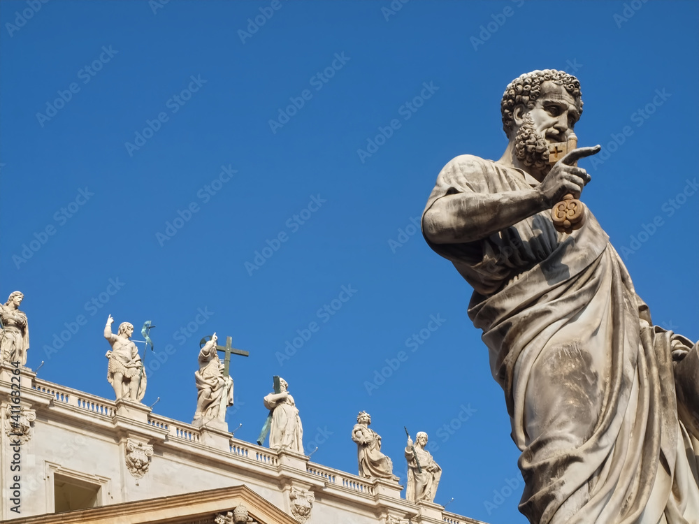 Sculpture on Famous St. Peters square or Piazza San Pietro in Rome with Saint Peter basilica