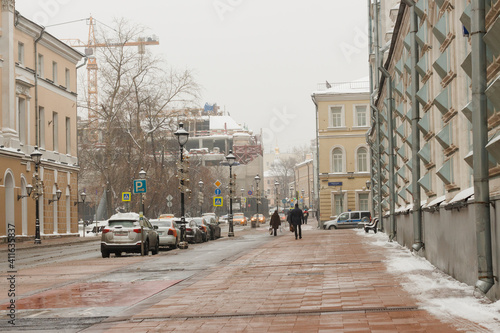 Moscow, Russia. Jan 22, 2021: Bolshaya Nikitskaya street. Winter. Snow. Cars
