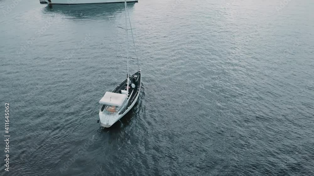 Yacht sailing on opened sea. Sailing boat. Yacht from drone. Yacht sailing on opened sea. Sailing boat. Yacht from drone.