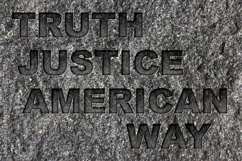 Truth Justice American Way etched in bold, dark gray text on black granite. Truth Justice American Way etched in bold, dark gray text on black granite.