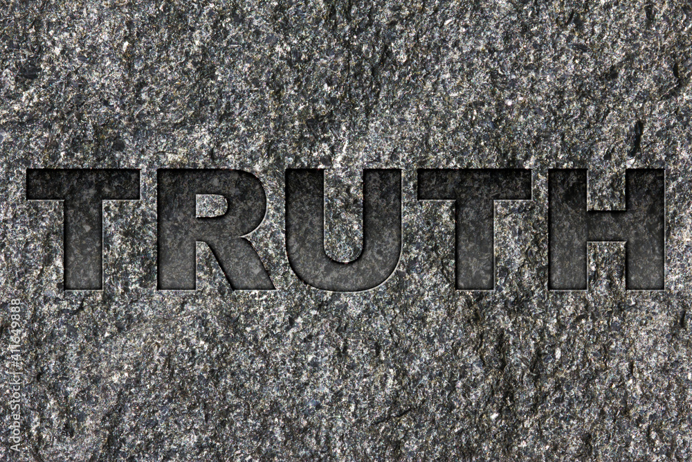 Truth etched in bold, dark gray text on black granite. Truth etched in bold, dark gray text on black granite.