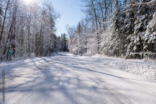 Snow covered road © homank76