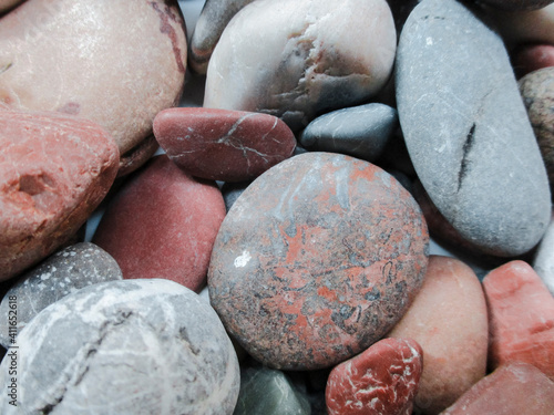 Colorful and many textures pebbles.