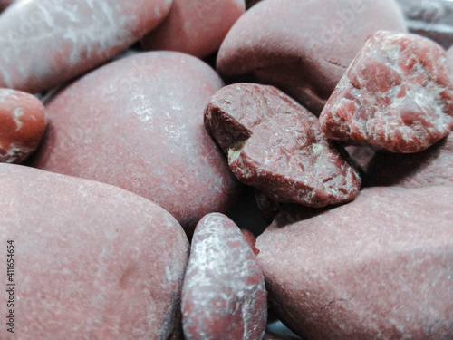 Colorful and many textures pebbles.