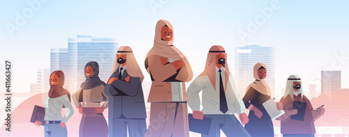 arab businesswoman team leader standing in front of arabic businesspeople leadership concept cityscape background horizontal portrait vector illustration