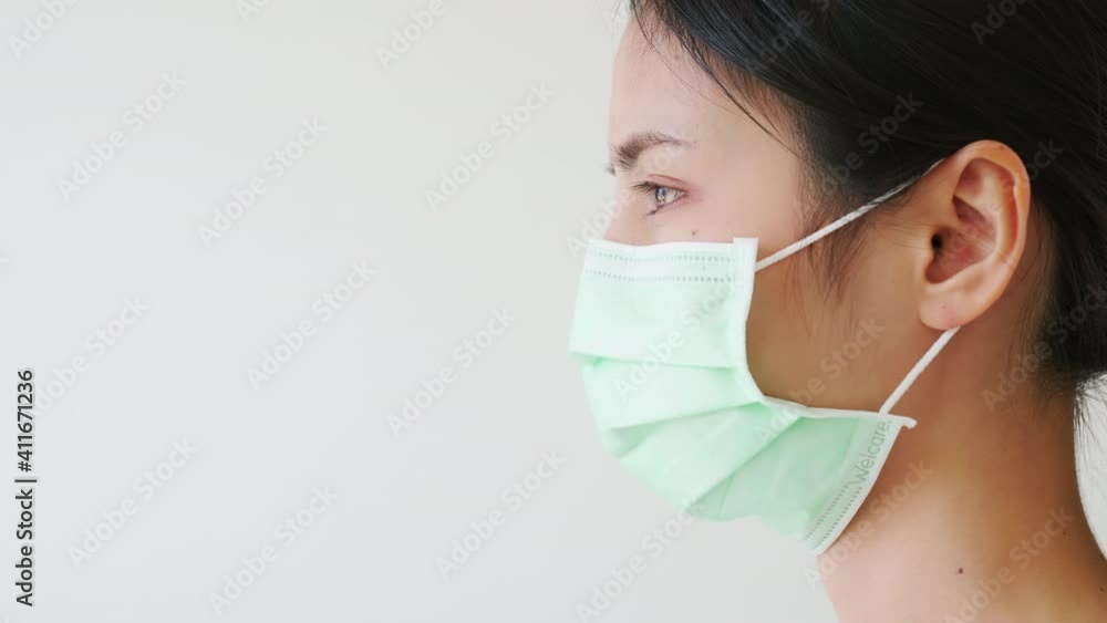 Asian women wear masks to protect disease on white background. Asian women wear masks to protect disease on white background.
