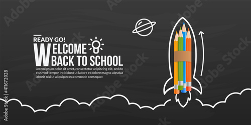 Colour pencils rocket launching with doodles on blackboard, welcome back to school background