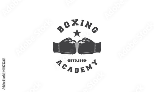 boxer academy logo with boxing gloves symbol
