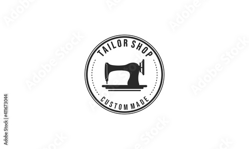 a logo for a tailor with a sewing machine illustration