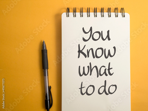 You know what to do, text words typography written on book against yellow background, life and business motivational inspirational