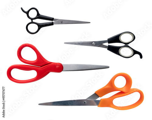 Red, Yellow, Black scissors isolated on white background, top view