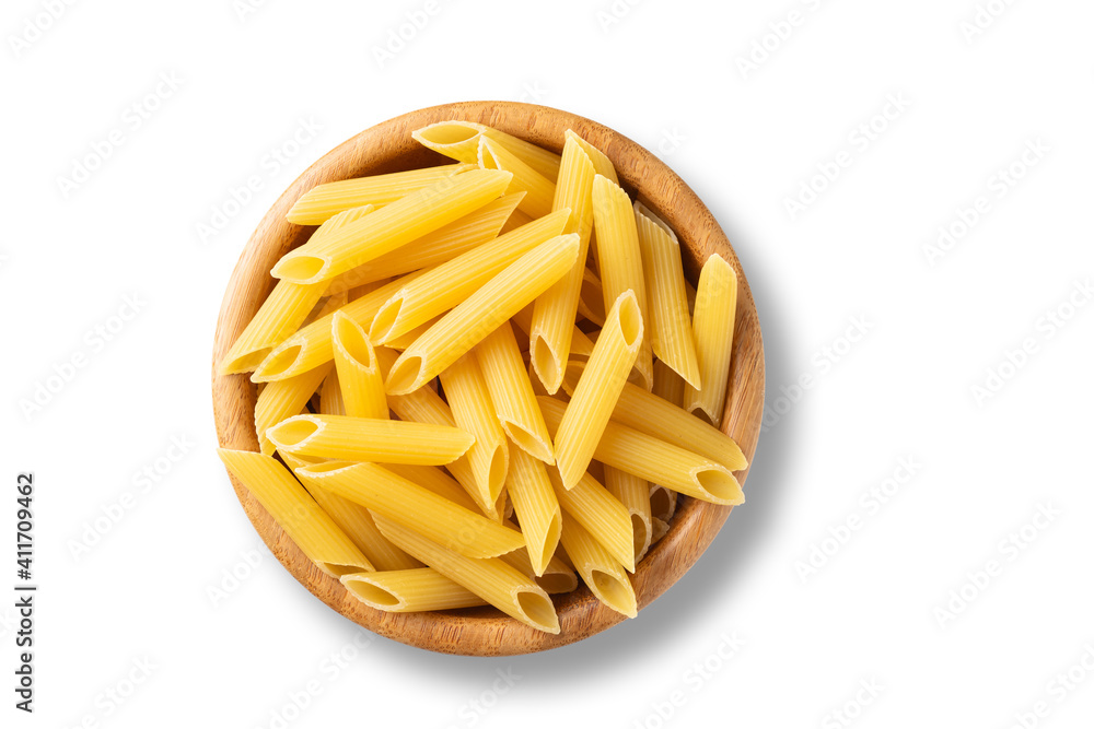 pasta in a wood bowl isolated on white background pasta in a wood bowl isolated on white background