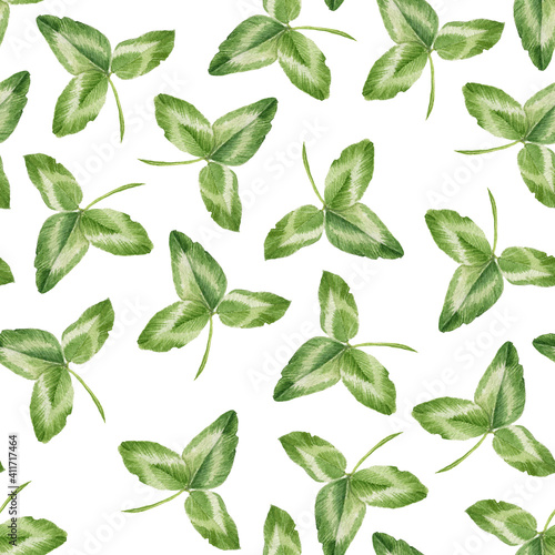 Seamless pattern with watercolor green clover leaves © cat_arch_angel