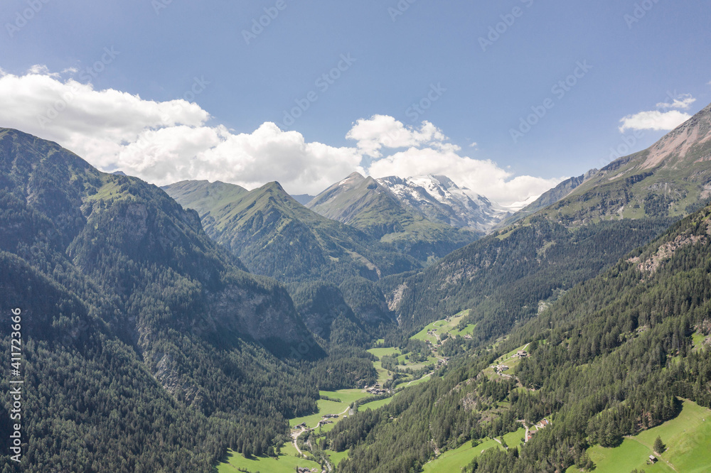 Aerial drone shot of Helligenblutt village in with view of Grossglockner mountain in Austria