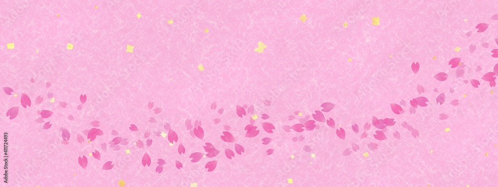ピンク色の和紙に舞う桜の花びらの背景