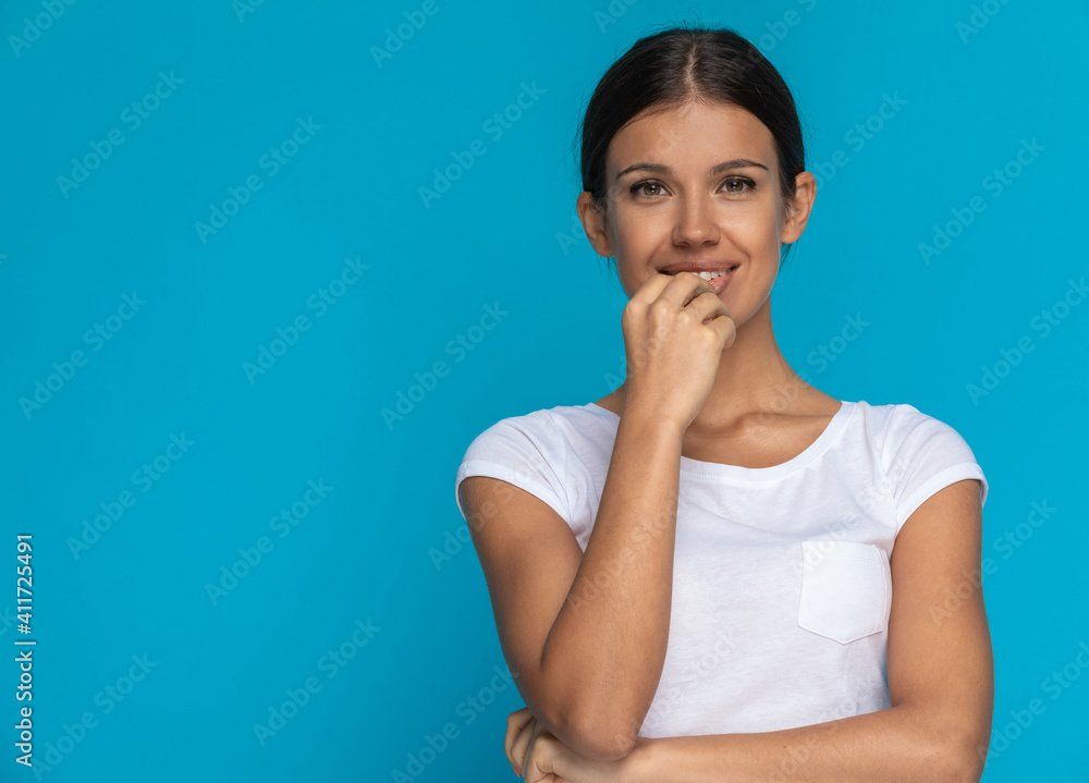 beautiful casual woman posing with a cute expression beautiful casual woman posing with a cute expression