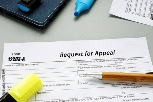 Business concept about Form 12203-A Request for Appeal with phrase on the sheet.