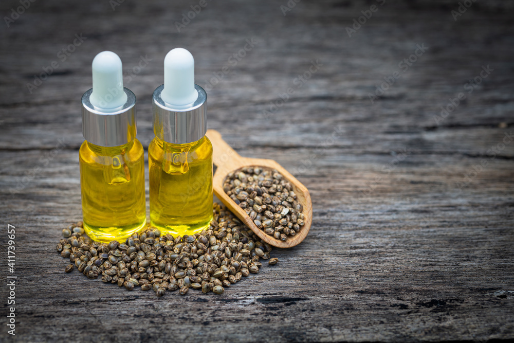 CBD oil hemp products, Medicinal cannabis with extract oil in a bottle. Medical cannabis concept CBD oil hemp products, Medicinal cannabis with extract oil in a bottle. Medical cannabis concept