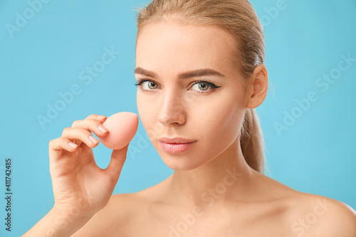 Beautiful young woman with ...