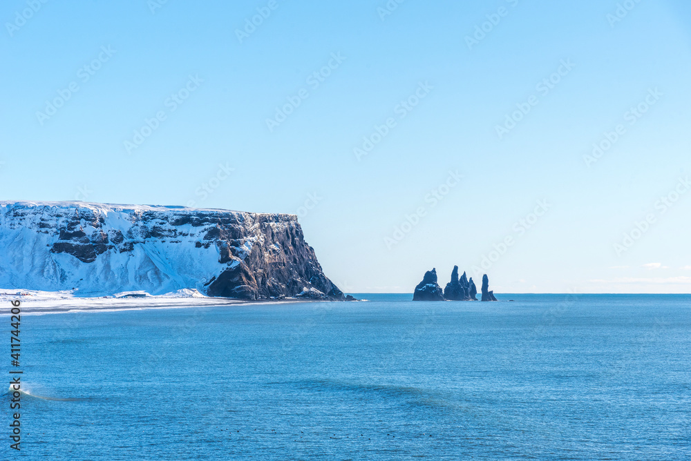 Naklejka premium Beautiful aerial winter landscape view of Reynisdrangar, Iceland.