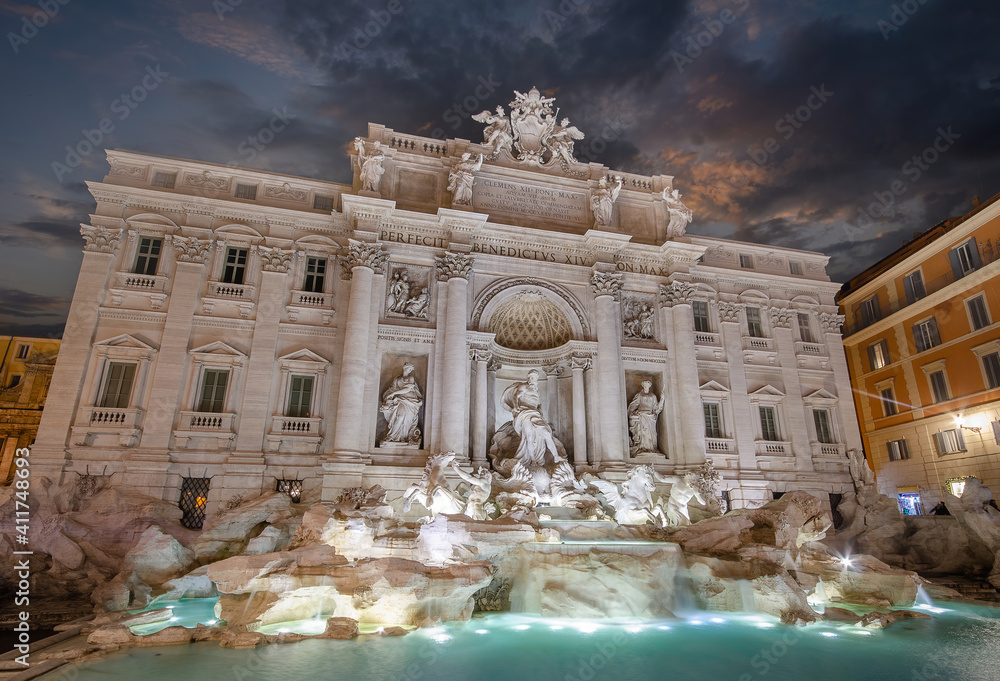The Trevi Fountain (Fontana di Trevi) in Rome, Italy at sunset. The largest Baroque fountain in Rome, Italia and the most beautiful
