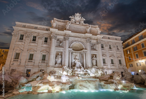 The Trevi Fountain (Fontana di Trevi) in Rome, Italy at sunset. The largest Baroque fountain in Rome, Italia and the most beautiful