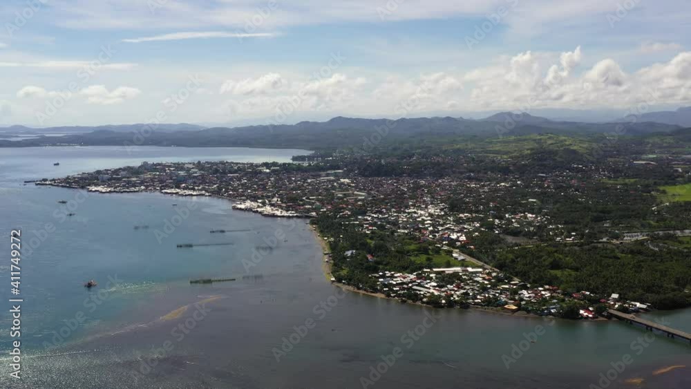 Cityscape of Surigao City, with residential areas. Mindanao, Philippines. City in Asia view from above. Surigao del Norte. Cityscape of Surigao City, with residential areas. Mindanao, Philippines. City in Asia view from above. Surigao del Norte.