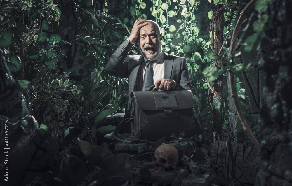 Terrified businessman lost in the jungle