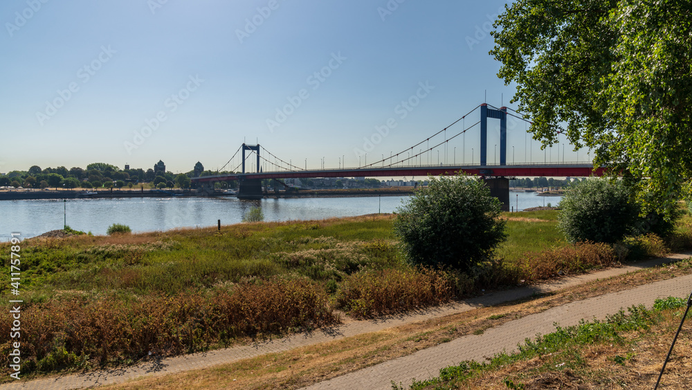 View over the River Rhine with the Friedrich-Ebert-Bridge, seen in Duisburg-Homberg, North Rhine-Westfalia, Germany