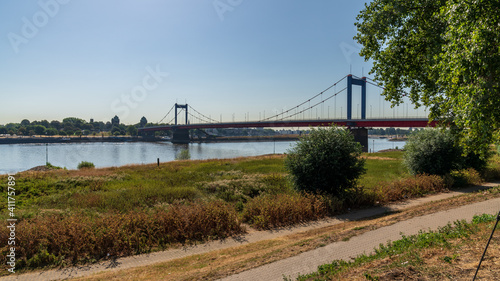 View over the River Rhine with the Friedrich-Ebert-Bridge, seen in Duisburg-Homberg, North Rhine-Westfalia, Germany © Bernd Brueggemann