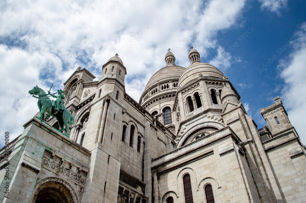 Paris, France - July 19, 2019: The facade and cupola of the Basilica of the Sacred Heart (SacrÃ© Coeur) in Paris, France