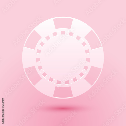 Paper cut Casino chip icon isolated on pink background. Paper art style. Vector.