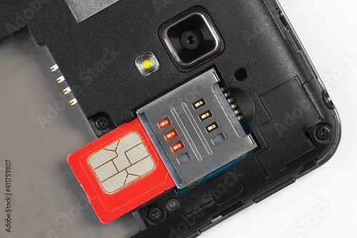 SIM card partially inserted into the slot.