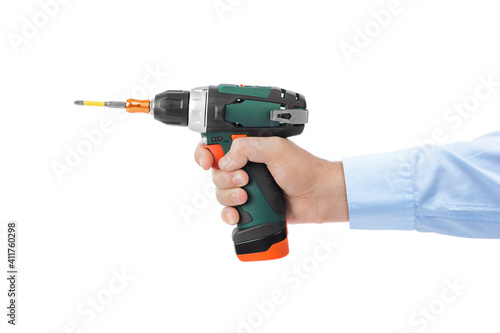 Electric drill or screwdriver in hand