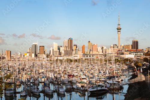 Auckland city and harbor at sunset, New Zealand photo