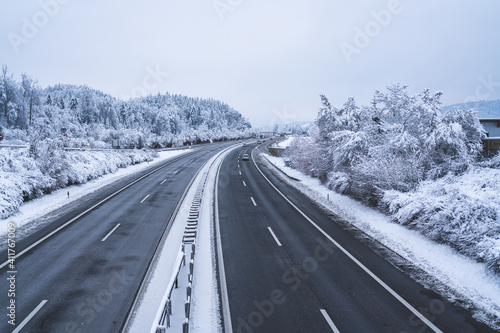 A Swiss highway in winter with snow.