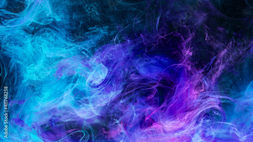 Color mist. Abstract background. Ink in water blend. Glowing smoke cloud texture. Fluorescent blue purple vapor splash with sparks on dark.