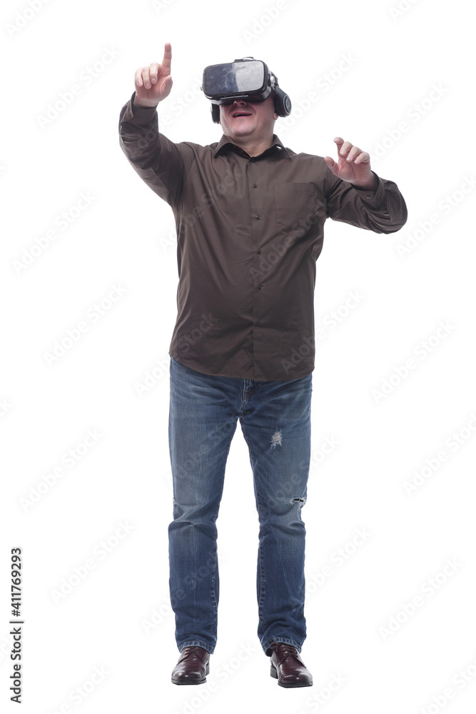 in full growth. casual man in virtual reality glasses. in full growth. casual man in virtual reality glasses.