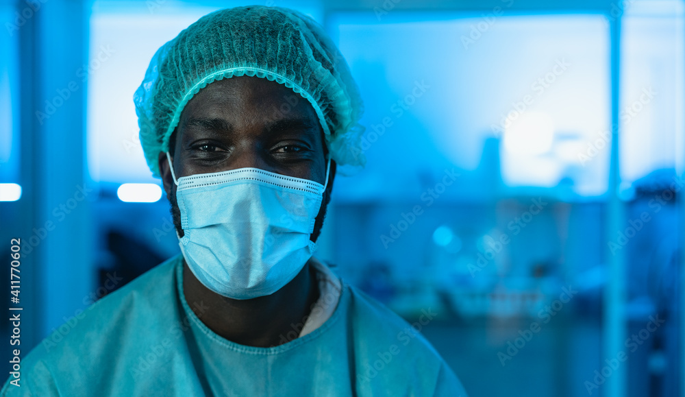 Portrait of doctor wearing protective face mask fighting against corona virus outbreak - Health care and medical worker concept Portrait of doctor wearing protective face mask fighting against corona virus outbreak - Health care and medical worker concept