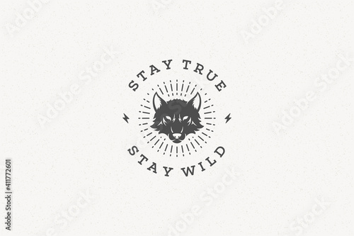 Quote typography with hand drawn wolf head symbol for greeting card or poster and other.